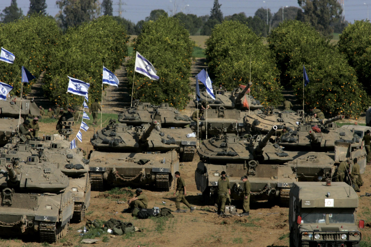 Israeli tanks and armored vehicles are seen on Israeli-Gaza border