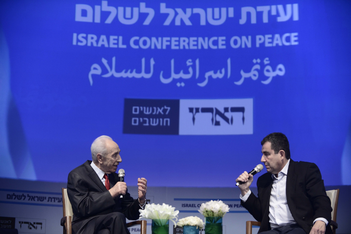 Telling liberal Jews what they want to hear, facts be damned. Ari Shavit (right) at a peace conference. Photo: Tomer Neuberg/FLASH90
