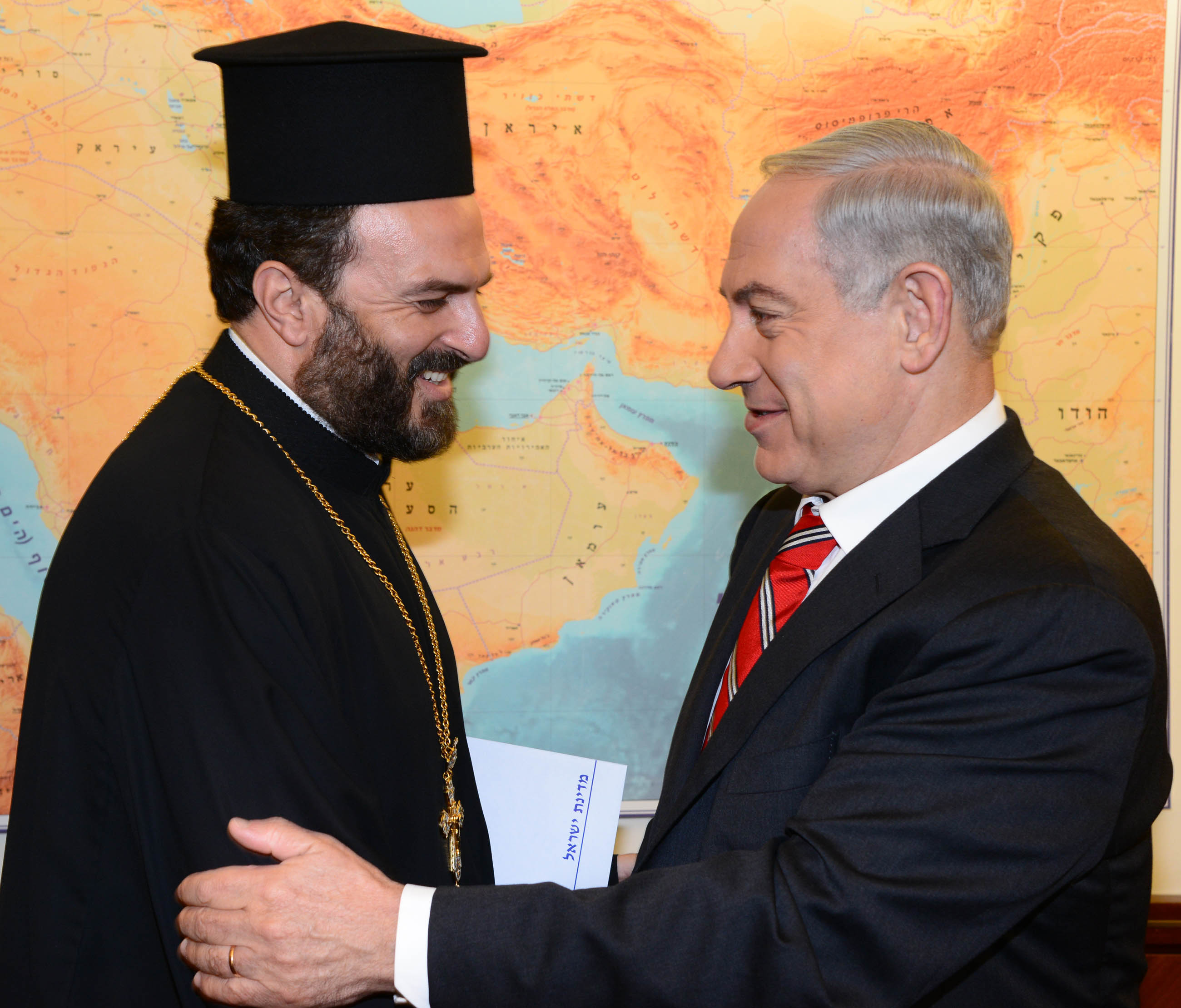 The right has made some efforts to woo minorities. It can do a lot more . Binyamin Netanyahu and Father Gabril Nadaf. Photo: Flash90