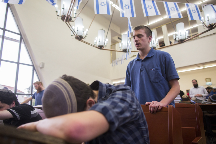 Jewish students pray at Mercaz Harav yeshiva in Jerusalem on Monday May 11, 2015. Photo by Yonatan Sindel/Flash90 *** Local Caption *** ???? ??? ????? ???????? ?????? ????
